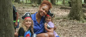 camp counselor with two campers at pirate camp